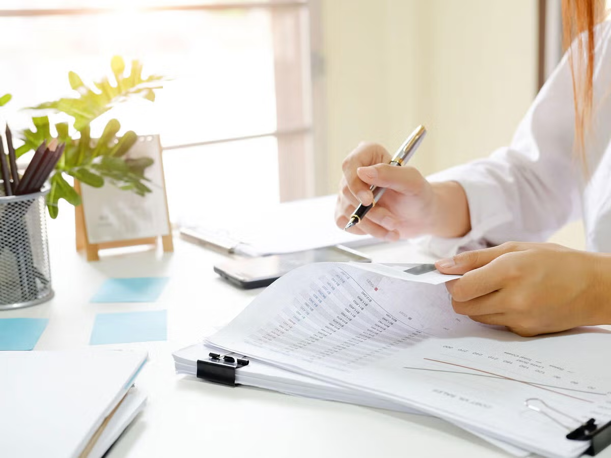Review of regulatory documentation on a desk